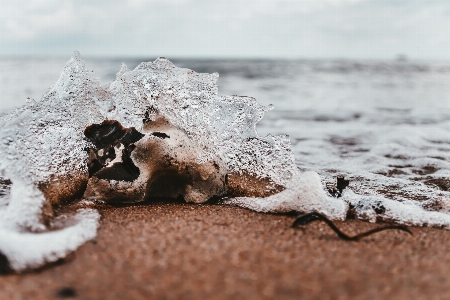 Wave water sand freezing Photo