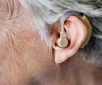 Ear close up hearing earrings Photo