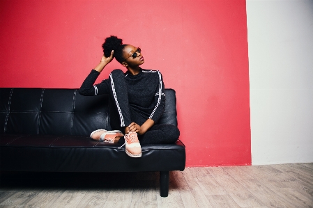 Red sitting pink furniture Photo