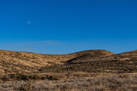 Foto Céu relevo montanhoso
 ambiente natural
 pastagem
