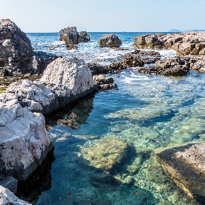 Body of water sea coast rock Photo