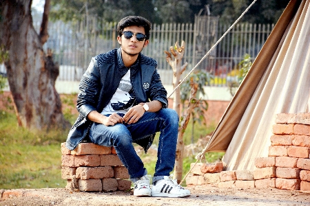 Street fashion cool sitting jeans Photo