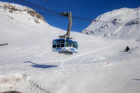 Cable car snow geological phenomenon winter Photo