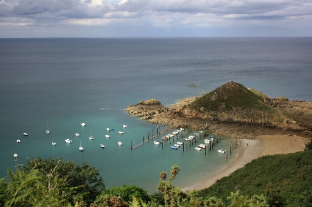 Boat sea body of water coast Photo