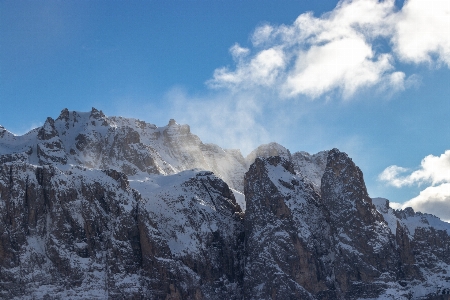 Mountainous landforms mountain range sky Photo