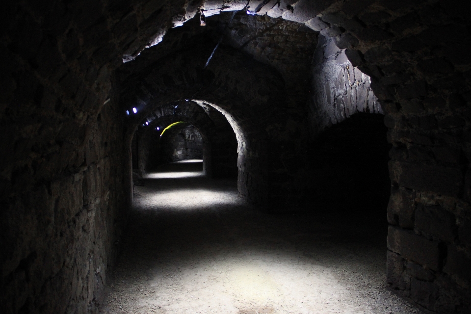 Catacomb tunnel darkness light