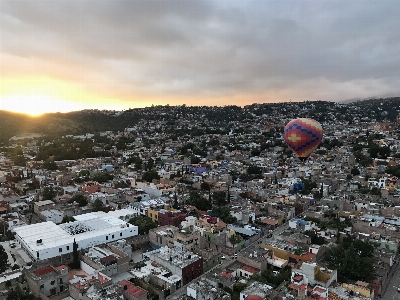 Sky hot air balloon crowd urban area Photo