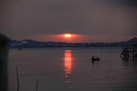 Sunset sky water afterglow Photo