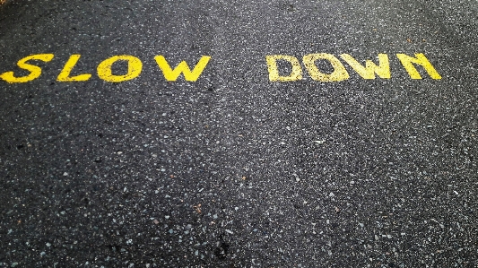 Slow down letters yellow Photo