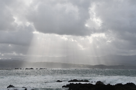 Cloud sea sun rocks Photo