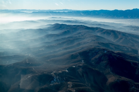 Mountain view above sky Photo