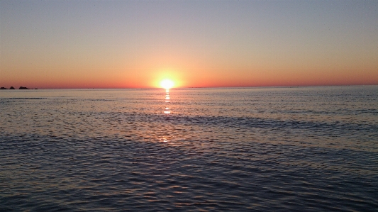 Foto Estate alba orizzonte corpo d'acqua
