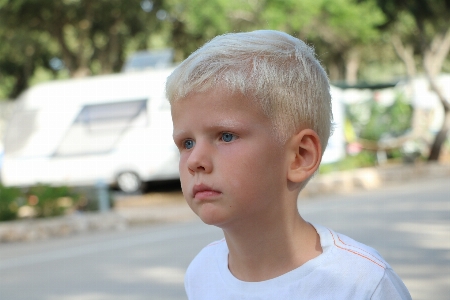 Boy blonde blue eyes portrait Photo