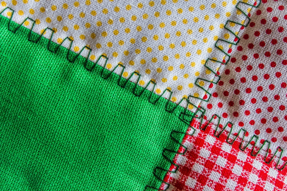 Patchwork green needlework textile