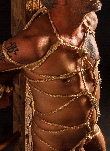 Bondage rope tied tattoo Photo