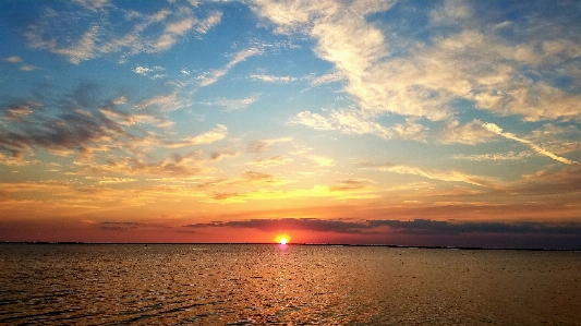 Sunrise blue skies clouds Photo