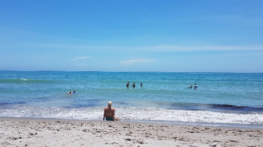 Beach girl water ocean Photo