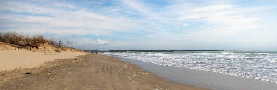 Beach sand blue sky Photo