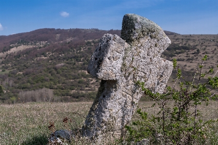 Cross ancient relic rock Photo