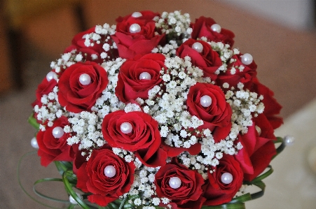 Bouquet roses red pearls Photo