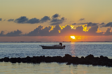 Sunrise boat jetty island Photo