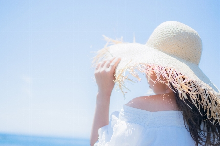 Girl white blue sky Photo