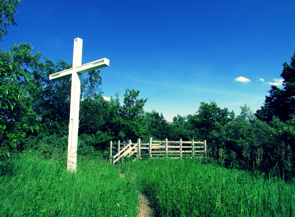 Blue sky cross white