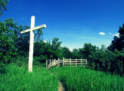 Blue sky cross white Photo