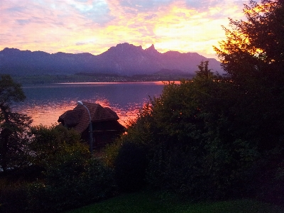 Sunset lake mountains landscape Photo