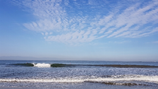 Ocean beach blue sky Photo