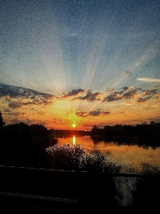 太陽 空 地平線 日没 写真