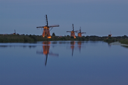 Windmills mills evening lighting Photo