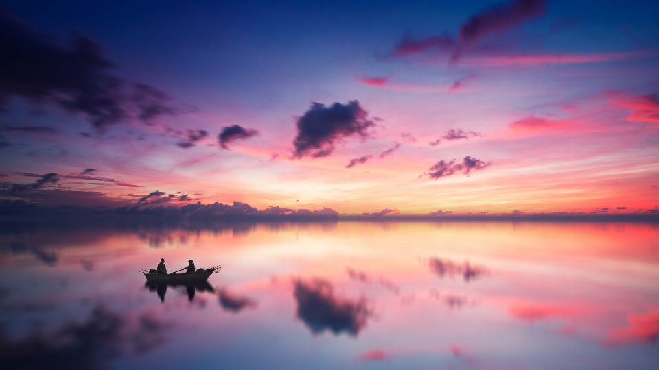 Ocean sunset boat fisherman