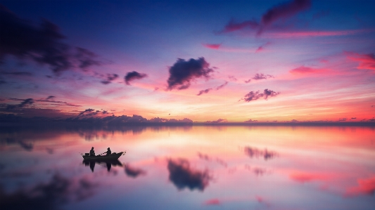 Ocean sunset boat fisherman Photo