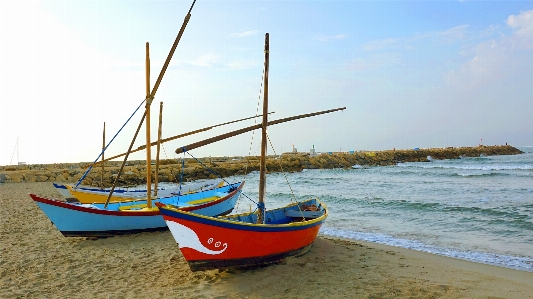 Foto Mare spiaggia barca trasporto dell'acqua
