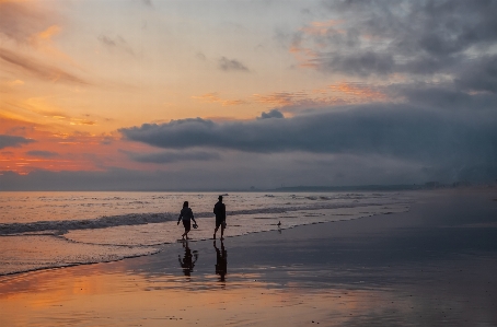 Ocean sunset sky beach Photo