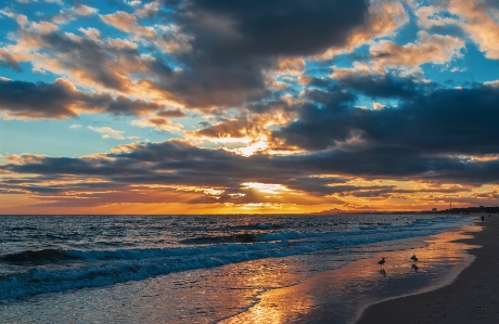 Sunset sky body of water horizon Photo