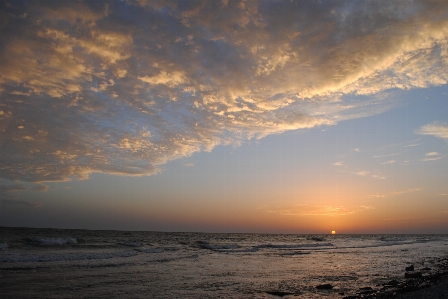 Sunset sun sea clouds Photo