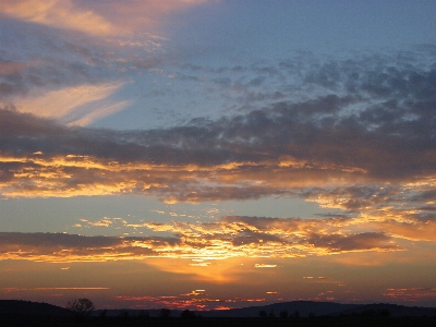 Foto Pôr do sol hora dourada
 céu