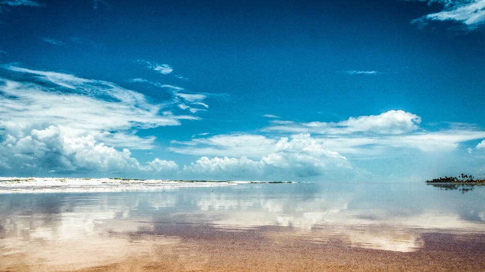 Blue sky beach mirror