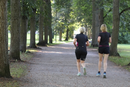 Running sport people in nature jogging Photo