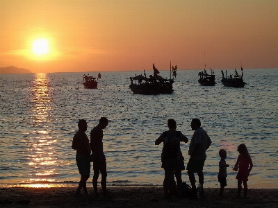 Foto Tramonto spiaggia orizzonte mare