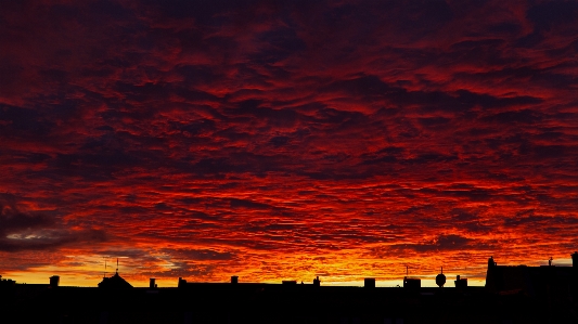 Photo Coucher de soleil ville ciel rouge