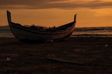 Boat beach sand sky Photo