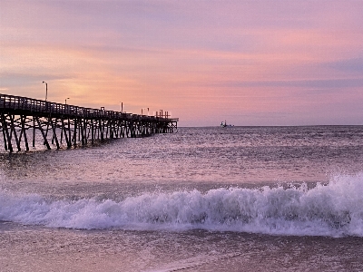 Sun sand sky wave Photo