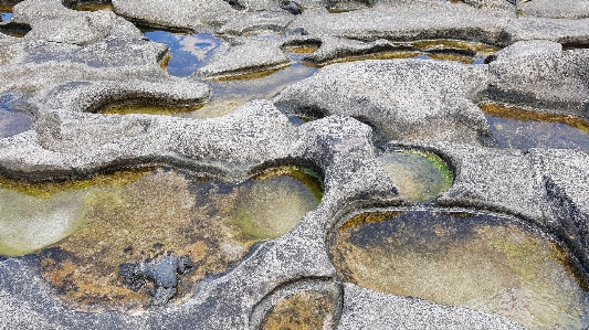 Stone shore sea water Photo