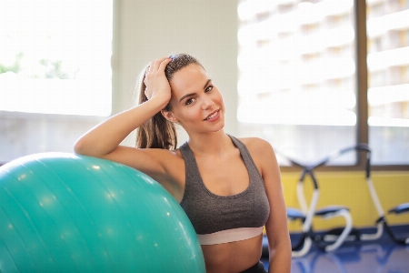 Woman swiss ball exercise equipment Photo