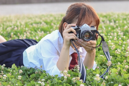 Foto Donna operatore di camera
 botanica
 pianta