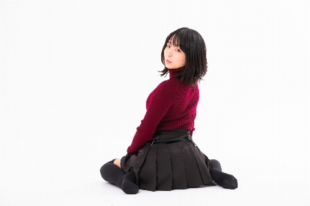 Woman sitting clothing black Photo