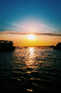 Fishing ship sunset sky Photo